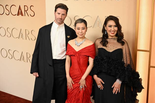 March 15, 2026, Los Angeles, California, USA: CHRIS APPELHANS, MAGGIE KANG AND MICHELLE L.M. WONG during red carpet arrivals for the 98th Academy Awards, presented by the Academy of Motion Picture Arts and Sciences (AMPAS), at the Dolby Theatre in Hollywood. Los Angeles USA  - ZUMAz03_ 20260315_abp_z03_077 Copyright: xKevinxSullivanx
