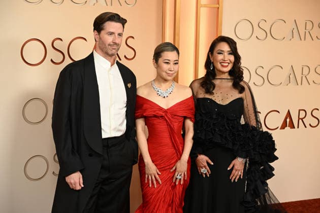 March 15, 2026, Los Angeles, California, USA: CHRIS APPELHANS, MAGGIE KANG AND MICHELLE L.M. WONG during red carpet arrivals for the 98th Academy Awards, presented by the Academy of Motion Picture Arts and Sciences (AMPAS), at the Dolby Theatre in Hollywood. Los Angeles USA  - ZUMAz03_ 20260315_abp_z03_078 Copyright: xKevinxSullivanx