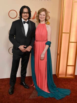 Dawn Hudson (right) and guest arrive on the red carpet for the 98th annual Academy Awards in the Hollywood section of Los Angeles on Sunday, March 15, 2026. Conan O Brien will host the Oscars for the second consecutive year.  LAP20260315262 JIMxRUYMEN
