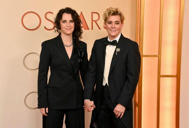 Catherine Carlile and Brandi Carlile arrive on the red carpet for the 98th annual Academy Awards in the Hollywood section of Los Angeles on Sunday, March 15, 2026. Conan O Brien will host the Oscars for the second consecutive year.  LAP20260315278 JIMxRUYMEN