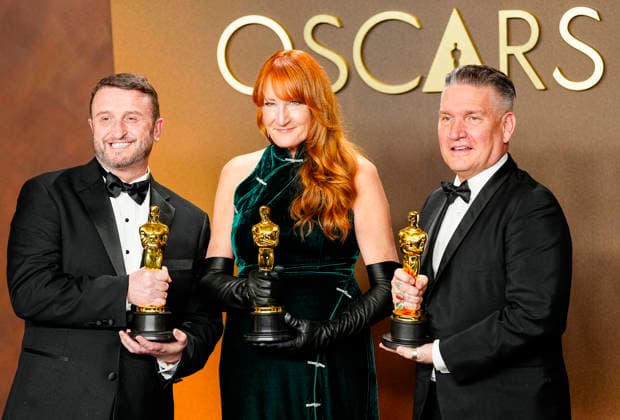 Mike Hill, Cliona Furey, and Jordan Samuel celebrate in the press photo room after winning the Makeup and Hairstyling Oscar for Frankenstein during the 98th annual Academy Awards in the Hollywood section of Los Angeles on Sunday, March 15, 2026. Conan O Brien is hosting the Oscars for the second consecutive year.  LAP20260315337 BONNIExCASH
