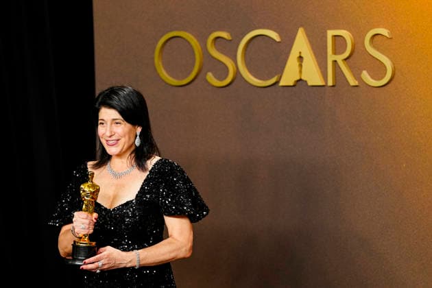 Cassandra Kulukundis celebrates in the press photo room after winning the Best Casting Oscar for One Battle After Another during the 98th annual Academy Awards in the Hollywood section of Los Angeles on Sunday, March 15, 2026. Conan O Brien is hosting the Oscars for the second consecutive year.  LAP20260315331 BONNIExCASH