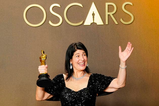 Cassandra Kulukundis celebrates in the press photo room after winning the Best Casting Oscar for One Battle After Another during the 98th annual Academy Awards in the Hollywood section of Los Angeles on Sunday, March 15, 2026. Conan O Brien is hosting the Oscars for the second consecutive year.  LAP20260315333 BONNIExCASH