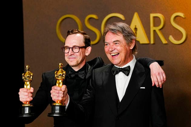 Chris Lavis and Maciek Szczerbowski celebrate in the press photo room after winning the Best Animated Short Film Oscar for The Girl Who Cried Pearls during the 98th annual Academy Awards in the Hollywood section of Los Angeles on Sunday, March 15, 2026. Conan O Brien is hosting the Oscars for the second consecutive year.  LAP202603152305 BONNIExCASH