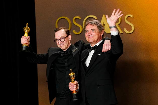 Chris Lavis and Maciek Szczerbowski celebrate in the press photo room after winning the Best Animated Short Film Oscar for The Girl Who Cried Pearls during the 98th annual Academy Awards in the Hollywood section of Los Angeles on Sunday, March 15, 2026. Conan O Brien is hosting the Oscars for the second consecutive year.  LAP202603152306 BONNIExCASH
