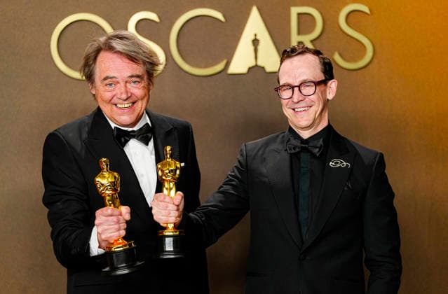 Chris Lavis and Maciek Szczerbowski celebrate in the press photo room after winning the Best Animated Short Film Oscar for The Girl Who Cried Pearls during the 98th annual Academy Awards in the Hollywood section of Los Angeles on Sunday, March 15, 2026. Conan O Brien is hosting the Oscars for the second consecutive year.  LAP202603152308 BONNIExCASH