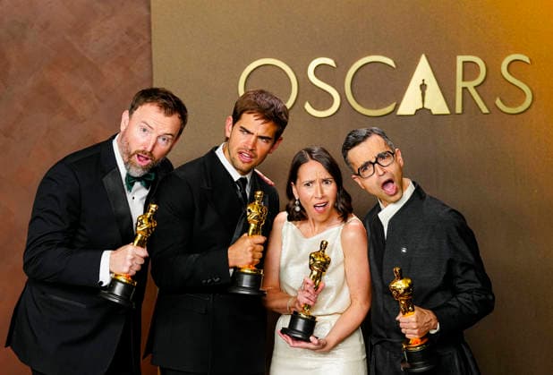 Natalie Musteata and Alexander Singh celebrate in the press photo room after winning the Best Live Action Short Film Oscar for Two People Exchanging Saliva during a tie with Sam A. Davis and Jack Piatt for The Singer in the 98th annual Academy Awards in the Hollywood section of Los Angeles on Sunday, March 15, 2026. Conan O Brien is hosting the Oscars for the second consecutive year.  LAP20260315360 BONNIExCASH