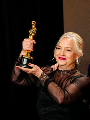 Tamara Deverell celebrates in the press photo room after winning the Best Production Design Oscar for Frankenstein during the 98th annual Academy Awards in the Hollywood section of Los Angeles on Sunday, March 15, 2026.  LAP20260315364 BONNIExCASH