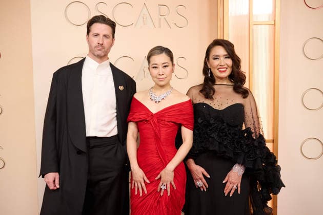 Chris Appelhans, Maggie Kang, and Michelle L. M. Wong arrive on the red carpet of the 98th OscarsÂ® at the DolbyÂ® Theatre at Ovation Hollywood on Sunday, March 15, 2026. Los Angeles CA USA  35008436PLX