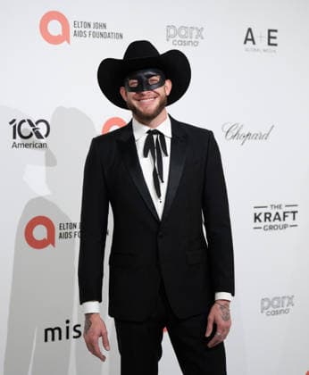 34th Annual Elton John AIDS Foundation Academy Awards Viewing Party Orville Peck arrives on the red carpet of the 34th Annual Elton John AIDS Foundation Academy Awards Viewing Party at West Hollywood Park in Hollywood California on March 15, 2026. (Contributing Photographer, Connor Terry) West Hollywood California United States Copyright: xConnorxTerry imageSPACEx