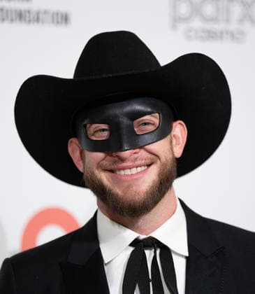 34th Annual Elton John AIDS Foundation Academy Awards Viewing Party Orville Peck arrives on the red carpet of the 34th Annual Elton John AIDS Foundation Academy Awards Viewing Party at West Hollywood Park in Hollywood California on March 15, 2026. (Contributing Photographer, Connor Terry) West Hollywood California United States Copyright: xConnorxTerry imageSPACEx