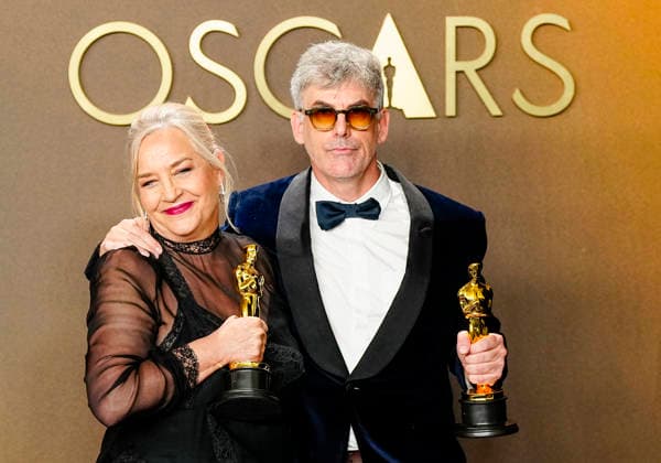 Tamara Deverell and Shane Vieau celebrate in the press photo room after winning the Best Production Design Oscar for Frankenstein during the 98th annual Academy Awards in the Hollywood section of Los Angeles on Sunday, March 15, 2026.  LAP20260315369 BONNIExCASH