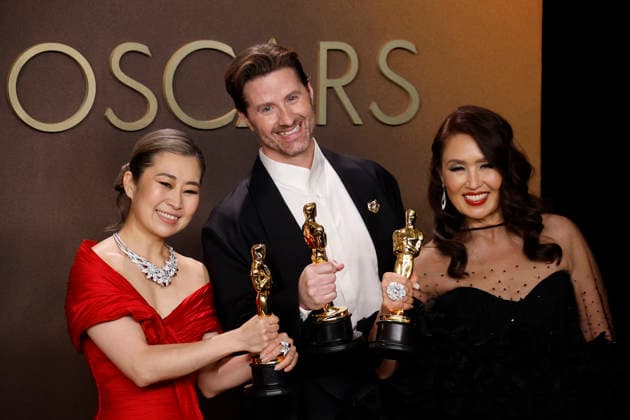 March 15, 2026, Hollywood, California, USA: (L-R) Maggie Kang, Chris Appelhans and Michelle L. M. Wong in the press room of the 98th Annual Academy Awards on Sunday March 15, 2026 at the Dolby Theater in Hollywood, California. BURT HARRIS BNS PI Hollywood USA  - ZUMAp124 20260315_zaa_p124_239 Copyright: xBurtxHarrisx