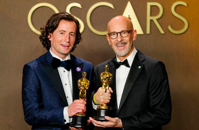 Conall Jones and Joshua Seftel celebrate in the press photo room after winning the Best Documentary Short Film Oscar for All the Empty Rooms during the 98th annual Academy Awards in the Hollywood section of Los Angeles on Sunday, March 15, 2026.  LAP2026031537176 BONNIExCASH