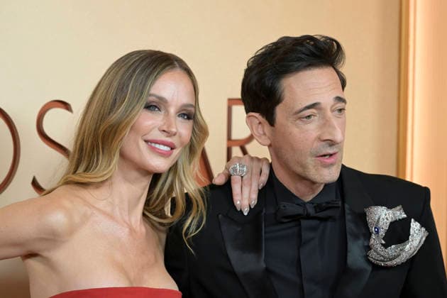 HOLLYWOOD, CA - MARCH 15: Adrien Brody and Georgina Chapman at the 98th Oscars at Dolby Theatre on March 15, 2026 in Hollywood, California. Copyright: xMediaPunchx