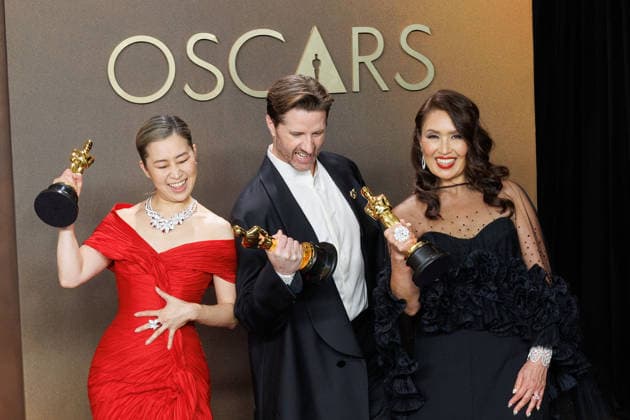 March 15, 2026, Hollywood, California, USA: (L-R) Maggie Kang, Chris Appelhans, and Michelle L.M. Wong, winners of the Best Animated Feature Film Award for Ã¢â‚¬oeKPop Demon HuntersÃ¢â‚¬Â, pose in the press room of the 98th Annual Academy Awards on Sunday March 15, 2026 at the Dolby Theater in Hollywood, California. PRENSA INTERNACIONAL Hollywood USA - ZUMAp124 20260315_zaa_p124_300 Copyright: xPrensaxInternacionalx
