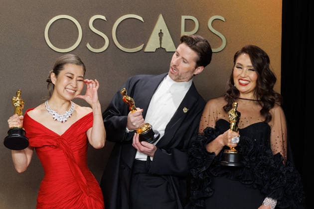 March 15, 2026, Hollywood, California, USA: (L-R) Maggie Kang, Chris Appelhans, and Michelle L.M. Wong, winners of the Best Animated Feature Film Award for Ã¢â‚¬oeKPop Demon HuntersÃ¢â‚¬Â, pose in the press room of the 98th Annual Academy Awards on Sunday March 15, 2026 at the Dolby Theater in Hollywood, California. PRENSA INTERNACIONAL Hollywood USA - ZUMAp124 20260315_zaa_p124_304 Copyright: xPrensaxInternacionalx
