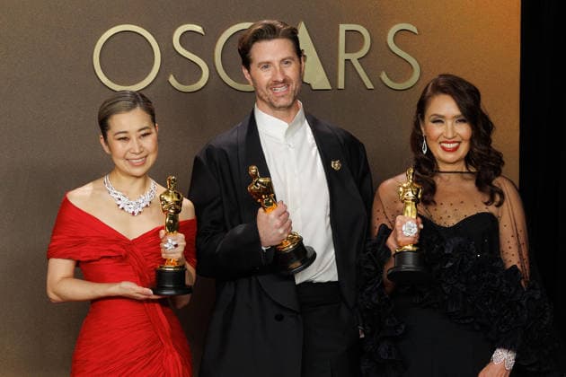 March 15, 2026, Hollywood, California, USA: (L-R) Maggie Kang, Chris Appelhans, and Michelle L.M. Wong, winners of the Best Animated Feature Film Award for Ã¢â‚¬oeKPop Demon HuntersÃ¢â‚¬Â, pose in the press room of the 98th Annual Academy Awards on Sunday March 15, 2026 at the Dolby Theater in Hollywood, California. PRENSA INTERNACIONAL Hollywood USA - ZUMAp124 20260315_zaa_p124_328 Copyright: xPrensaxInternacionalx