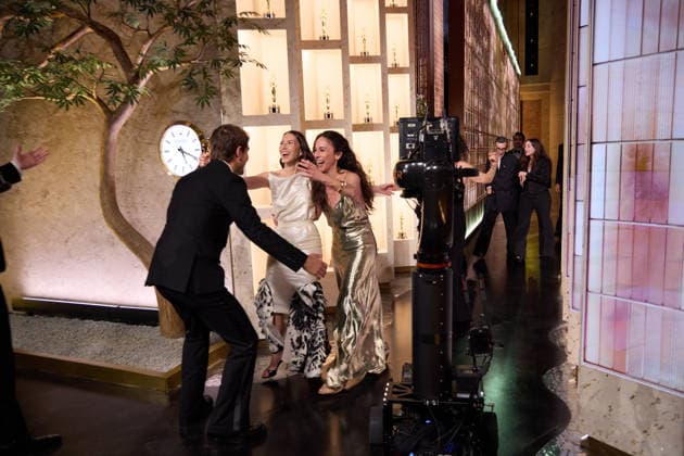 March 15, 2026, Hollywood, California, USA: Sam A. Davis, Natalie Musteata, and guest backstage during the live 98th Oscars at the Dolby Theatre at Ovation Hollywood in Los Angeles. Hollywood USA  - ZUMAz03_ 20260315_zah_z03_065 Copyright: xAlxSeibx
