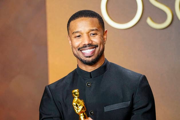 Michael B. Jordan celebrates in the press photo room after winning the Best Actor in a Leading Role Oscar for Sinners during the 98th annual Academy Awards in the Hollywood section of Los Angeles on Sunday, March 15, 2026.  LAP2026031543346 BONNIExCASH