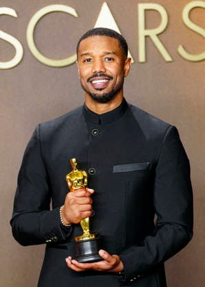 Michael B. Jordan celebrates in the press photo room after winning the Best Actor in a Leading Role Oscar for Sinners during the 98th annual Academy Awards in the Hollywood section of Los Angeles on Sunday, March 15, 2026.  LAP20260315438 BONNIExCASH