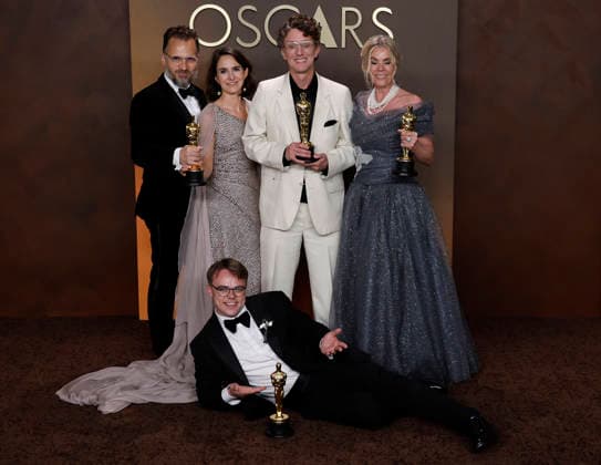 March 15, 2026, Hollywood, California, USA: (L-R) Radovan Sibrt, AlAÂ¾bÄºta KaroÂ¡skovoÂ¡, David Borenstein, Pavel Talankin (laying on floor) in the press room of the 98th Annual Academy Awards on Sunday March 15, 2026 at the Dolby Theater in Hollywood, California. BURT HARRIS BNS PI Hollywood USA - ZUMAp124 20260315_zaa_p124_444 Copyright: xBurtxHarrisx