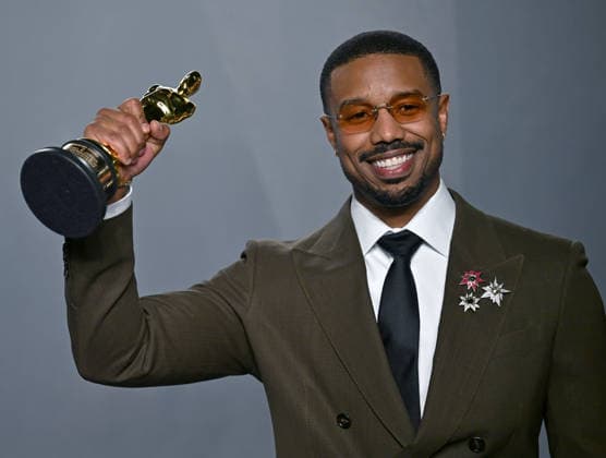 Michael B. Jordan holds up his Best Actor Oscar as he arrives for the Vanity Fair Oscar Party at LACMA s David Geffen Galleries in Los Angeles, California on Sunday, March 15, 2026.  LAP202603157019 CHRISxCHEW