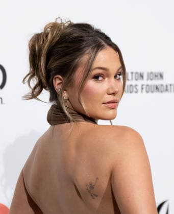 34th Annual Elton John AIDS Foundation Academy Awards Viewing Party Olivia Holt arrives on the red carpet of the 34th Annual Elton John AIDS Foundation Academy Awards Viewing Party at West Hollywood Park in Hollywood California on March 15, 2026. (Contributing Photographer, Connor Terry) West Hollywood California United States Copyright: xConnorxTerry imageSPACEx