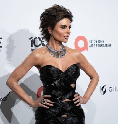 34th Annual Elton John AIDS Foundation Academy Awards Viewing Party Lisa Rinna arrives on the red carpet of the 34th Annual Elton John AIDS Foundation Academy Awards Viewing Party at West Hollywood Park in Hollywood California on March 15, 2026. (Contributing Photographer, Connor Terry) West Hollywood California United States Copyright: xConnorxTerry imageSPACEx