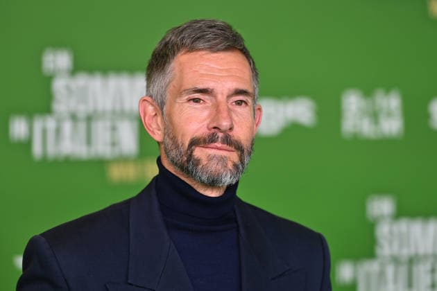Micky BEISENHERZ, Einzelbild,angeschnittenes Einzelmotiv,Portrait,Portraet. Premiere EIN SOMMER IN ITALIEN-WM 1990. am 16.03.20226 im Mathaeser Kino in Muenchen. Roter Teppich,Red Carpet.