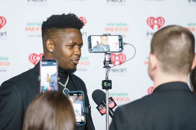 March 16, 2026: Austin, Texas. 2026 IHeartPodcast Awards, Hosts, Presenters, and Guest attendees arrive at the red carpet. Clifford Taylor IV, Former Florida Gator speaks with Press. - ZUMAda1_ 20260316_zap_da1_036 Copyright: xSandraxDahdahx