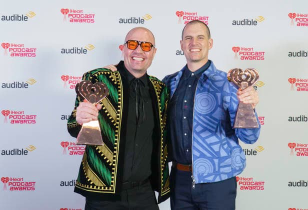 March 16, 2026: Austin, Texas. 2026 IHeartPodcast Awards, winners pose with their awards. Ben Mandelker & Ronnie Karam - Watch What Crappens Best TV & Film. - ZUMAda1_ 20260316_zap_da1_065 Copyright: xSandraxDahdahx