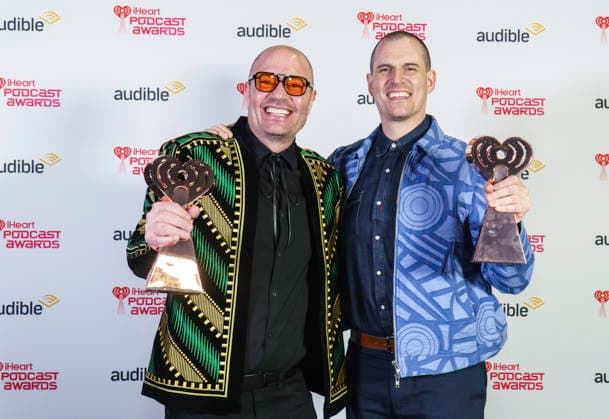 March 16, 2026: Austin, Texas. 2026 IHeartPodcast Awards, winners pose with their awards. Ben Mandelker & Ronnie Karam - Watch What Crappens Best TV & Film. - ZUMAda1_ 20260316_zap_da1_089 Copyright: xSandraxDahdahx