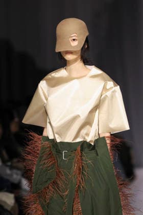 March 19, 2026, Tokyo, Japan: A model wearing fashion brand YOHEI OHNO walks down the runway during the Rakuten Fashion Week TOKYO 2026 Autumn Winter Collection. The fashion week runs from March 16 to 21. Tokyo Japan  - ZUMAm191 20260319_aap_m191_012 Copyright: xRodrigoxReyesxMarinx