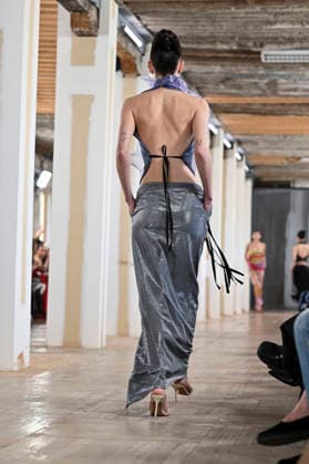 Mercedes-Benz Fashion Week Madrid, Spain - 19 Mar 2026 A model walks the runway wearing a design by Ernesto Naranjo during Mercedes-Benz Fashion Week de Madrid at Palacio Fernaz Nunoz. Madrid Spain Copyright: xAtilanoxGarciax xSOPAxImagesx photos09351
