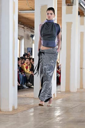 Mercedes-Benz Fashion Week Madrid, Spain - 19 Mar 2026 A model walks the runway wearing a design by Ernesto Naranjo during Mercedes-Benz Fashion Week de Madrid at Palacio Fernaz Nunoz. Madrid Spain Copyright: xAtilanoxGarciax xSOPAxImagesx photos09350