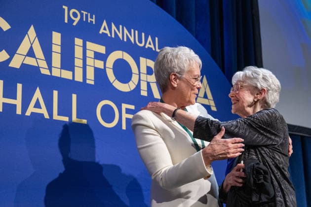March 19, 2026, Sacramento, Ca, USA: Actress Jamie Lee Curtis hugs Riane Eisler, Groundbreaking systems scientist, cultural historian and futurist during the induction of the 19th Class to the California Hall of Fame at the California Museum on Thursday, March 19, 2026 in Sacramento. Sacramento USA - ZUMAj89_ 20260319_zaf_j89_007 Copyright: xPaulxKitagakixJr.x