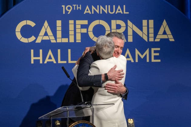 March 19, 2026, Sacramento, Ca, USA: Gov. Gavin Newsom hugs actress Jamie Lee Curtis during the induction of the 19th class to the California Hall of Fame at the California Museum on Thursday, March 19, 2026, in Sacramento. Sacramento USA - ZUMAj89_ 20260319_zaf_j89_035 Copyright: xPaulxKitagakixJr.x