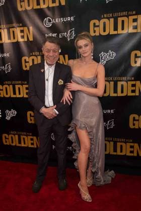 March 19, 2026, Los Angeles, California, USA: ALENA SAVOSTIKOVA and her manager attends the Level 33 Entertainment Ã¢â‚¬oeGOLDENÃ¢â‚¬Â red carpet premiere on March 19, 2026 at the Laemmle Royal Theatre in Los Angeles, California. Los Angeles USA - ZUMAw213 20260319_zep_w213_060 Copyright: xDrewxBlyx