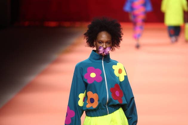 Agatha Ruiz de la Prada fashion show at Mercedes Benz Fashion Week in Madrid A model during an Agatha Ruiz de la Prada fashion show at Mercedes Benz Fashion Week, March 20, 2026, in Madrid Spain The Madrid-based designer Agatha Ruiz de la Prada, a Spanish fashion icon for her pop universe of vibrant colors and geometric shapes, presents her spring summer 2026 collection at MBFWMadrid, Spanish fashion icon for her pop universe of vibrant colors and geometric shapes, presents at MBFWMadrid her spring summer collection 2026, created with the support of artificial intelligence and faithful to her unmistakable hearts and playful volumes at IFEMA Madrid 20 MARCH 2026 Madrid Madrid Madrid Spain  Copyright: xEduardoxParrax 7383008