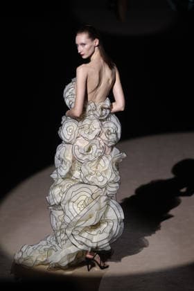 Hannibal Laguna fashion show at Mercedes Benz Fashion Week Madrid A model at a Hannibal Laguna fashion show during Mercedes Benz Fashion Week, March 20, 2026, in Madrid Spain The designer Hannibal Laguna, master of womens couture and benchmark of handcrafted luxury, presents at MBFWMadrid his spring summer collection 2026 Lazuliflow, inspired by the shades of blue and the movement of the sea, in the framework of the great catwalk of IFEMA Madrid 20 MARCH 2026 FASHION Madrid Madrid Espana  Copyright: xEduardoxParrax 7383219