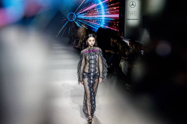 Custo Barcelona fashion show at Mercedes Benz Fashion Week Madrid A model during the Custo Barcelona fashion show at Mercedes Benz Fashion Week Madrid, March 20, 2026, in Madrid Spain The Catalan firm, led by designer Custo Dalmau, presents at the MBFWMadrid its new collection We Own the Light, a proposal of free spirit and vibrant graphics that claims the light as a symbol of energy and identity on the great catwalk of IFEMA Madrid 20 MARCH 2026 FASHION SHOW DESIGNER CUSTO MBFW Madrid Madrid Madrid Spain  Copyright: xRicardoxRubiox 7383549