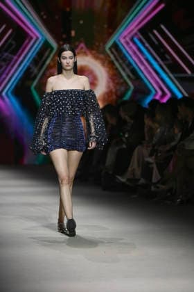 Custo - Mercedes-Benz Fashion Week Madrid - 20 Mar 2026 A model walks the runway wearing a design by Custo during the Mercedes-Benz Fashion Week de Madrid in IFEMA. Madrid Spain Copyright: xAtilanoxGarciax xSOPAxImagesx photos09789