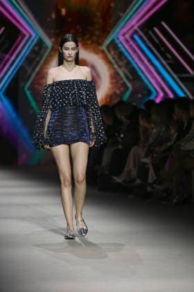Custo - Mercedes-Benz Fashion Week Madrid - 20 Mar 2026 A model walks the runway wearing a design by Custo during the Mercedes-Benz Fashion Week de Madrid in IFEMA. Madrid Spain Copyright: xAtilanoxGarciax xSOPAxImagesx photos09790