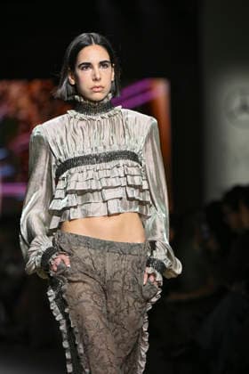 Custo - Mercedes-Benz Fashion Week Madrid - 20 Mar 2026 A model walks the runway wearing a design by Custo during the Mercedes-Benz Fashion Week de Madrid in IFEMA. Madrid Spain Copyright: xAtilanoxGarciax xSOPAxImagesx photos09763
