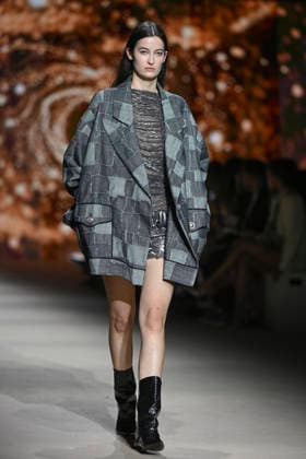 Custo - Mercedes-Benz Fashion Week Madrid - 20 Mar 2026 A model walks the runway wearing a design by Custo during the Mercedes-Benz Fashion Week de Madrid in IFEMA. Madrid Spain Copyright: xAtilanoxGarciax xSOPAxImagesx photos09728