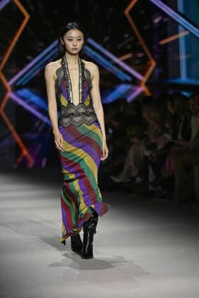 Custo - Mercedes-Benz Fashion Week Madrid - 20 Mar 2026 A model walks the runway wearing a design by Custo during the Mercedes-Benz Fashion Week de Madrid in IFEMA. Madrid Spain Copyright: xAtilanoxGarciax xSOPAxImagesx photos09741