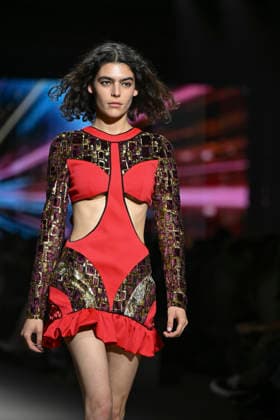Custo - Mercedes-Benz Fashion Week Madrid - 20 Mar 2026 A model walks the runway wearing a design by Custo during the Mercedes-Benz Fashion Week de Madrid in IFEMA. Madrid Spain Copyright: xAtilanoxGarciax xSOPAxImagesx photos09707