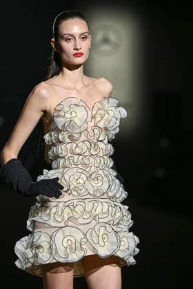 Hannibal Laguna - Mercedes-Benz Fashion Week Madrid in Madrid, Spain - 20 Mar 2026 A model walks the runway wearing a design by Hannibal Laguna during Mercedes-Benz Fashion Week de Madrid in IFEMA. Madrid Spain Copyright: xAtilanoxGarciax xSOPAxImagesx photos09683
