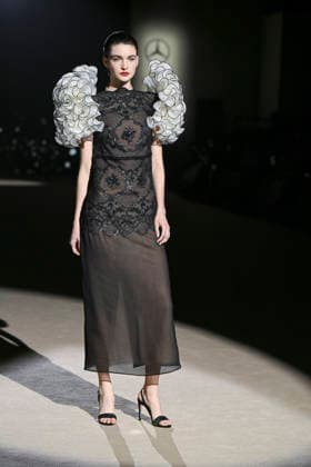 Hannibal Laguna - Mercedes-Benz Fashion Week Madrid in Madrid, Spain - 20 Mar 2026 A model walks the runway wearing a design by Hannibal Laguna during Mercedes-Benz Fashion Week de Madrid in IFEMA. Madrid Spain Copyright: xAtilanoxGarciax xSOPAxImagesx photos09631